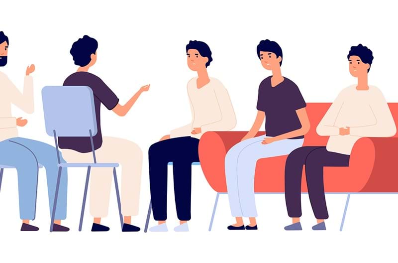 An illustration of a group of men sitting in a circle on chairs. 